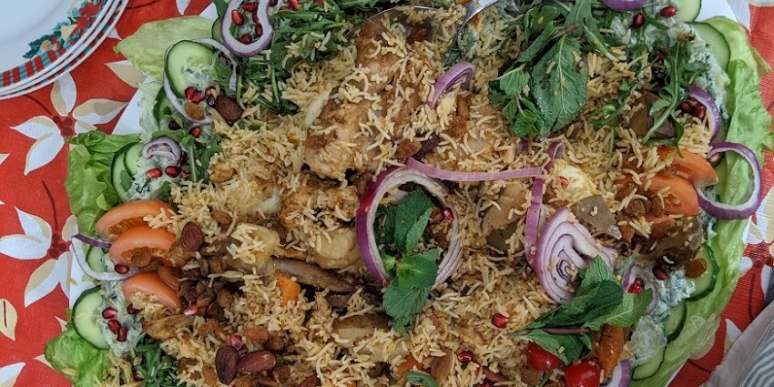 Snapshot of the mouth-watering Biryani served on the Banana leaf with varsity of souce