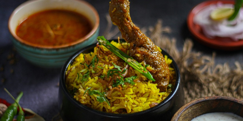 A glimpse of biryani being served, one of the best street food in Lajpat Nagar, Delhi.