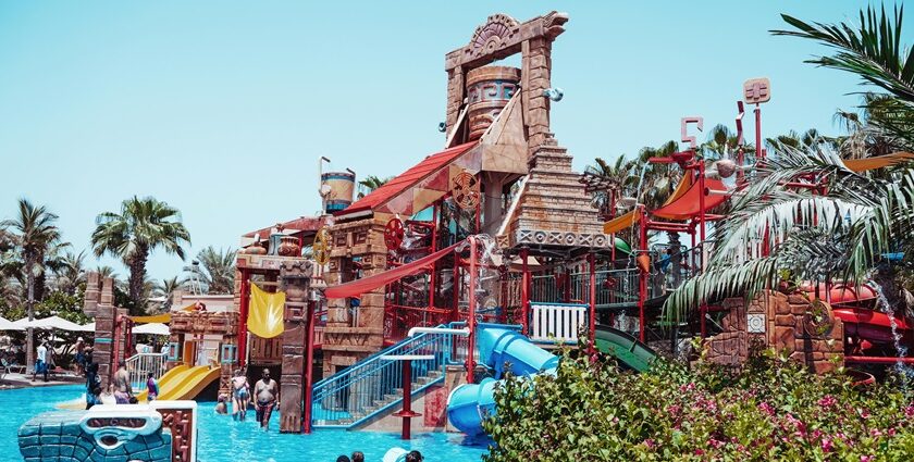 A vibrant Blue Bubble Water Park featuring multiple water rides and thrilling water activities