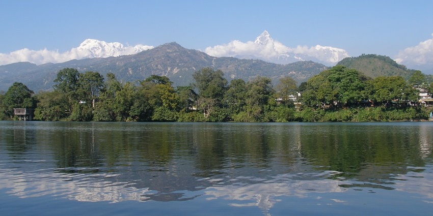 A scenic view of the Phewa Lake amidst beautiful landscapes, a favourite spot for Valentine's Day in Nepal.
