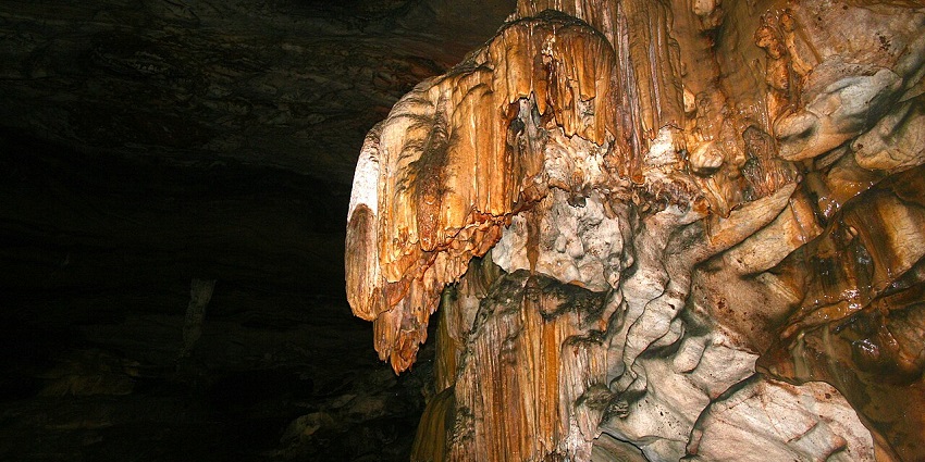 Scenic image of Borra Caves home to naturally formed lime stalagmite in Andhra Pradesh