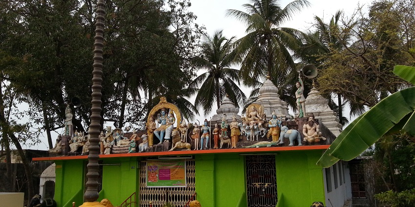The entrance of Brahmam Gari Mattam, featuring traditional architecture and decorative elements.