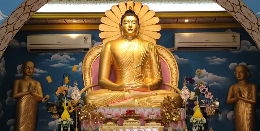 A serene view of the Buddha statue inside the temple, radiating peace and tranquility