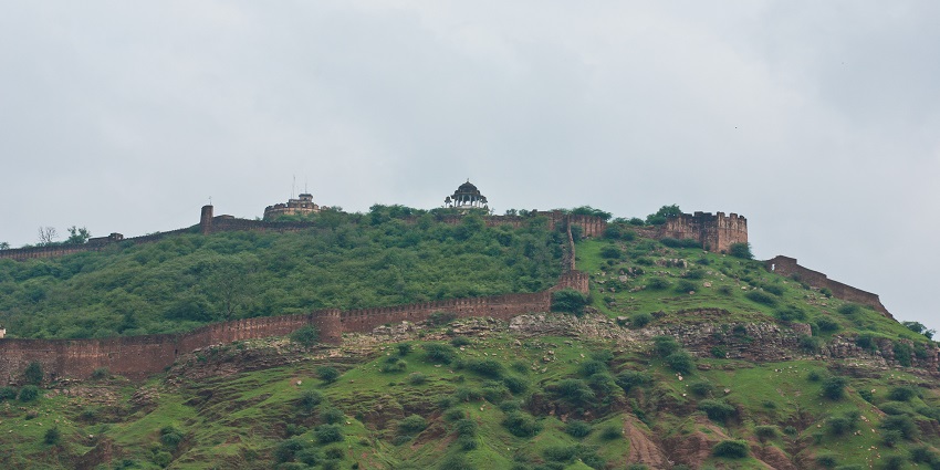 The impressive Taragarh Fort in Bundi with surrounding greenery, is a major place to visit for history enthusiasts.