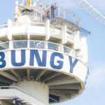 A person experiencing the thrill of bungee jumping in Kathmandu from a high elevation.