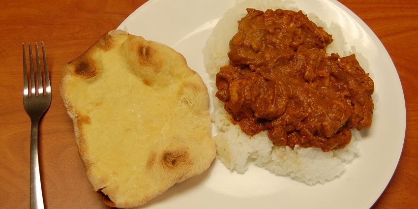 Mouth watering image of the delicious butter chicken with naan which is one of the best food in Jalandhar