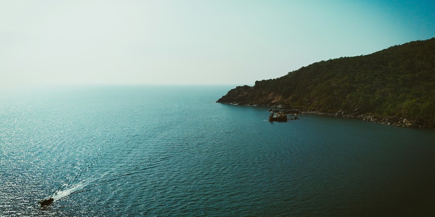 An aerial view of Butterfly Beach, one of the quaint places to visit in Goa for couples.