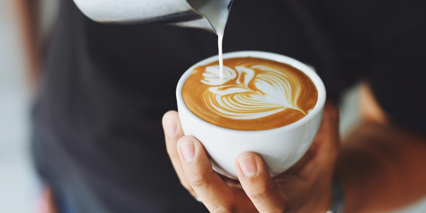 A rich and creamy Café Mocha coffee served in a glass cup