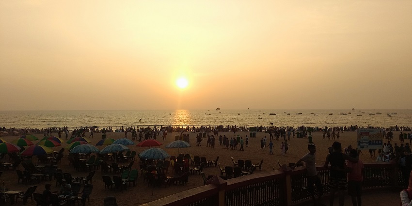 Enjoy beachside bars and live music parties at night at Calangute Beach in Goa..