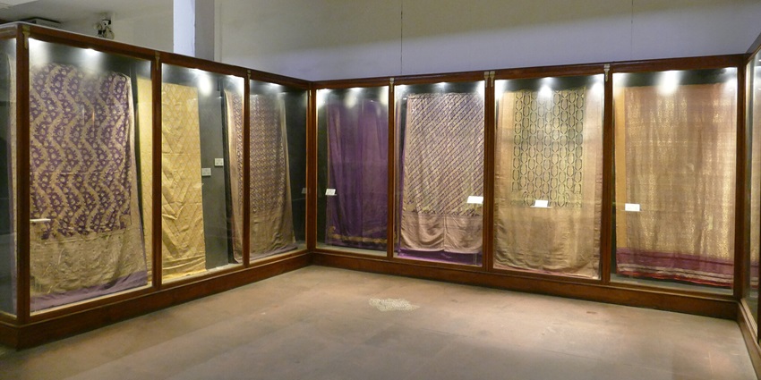 Textiles and designer clothes on exhibition at Calico Museum of Textile.