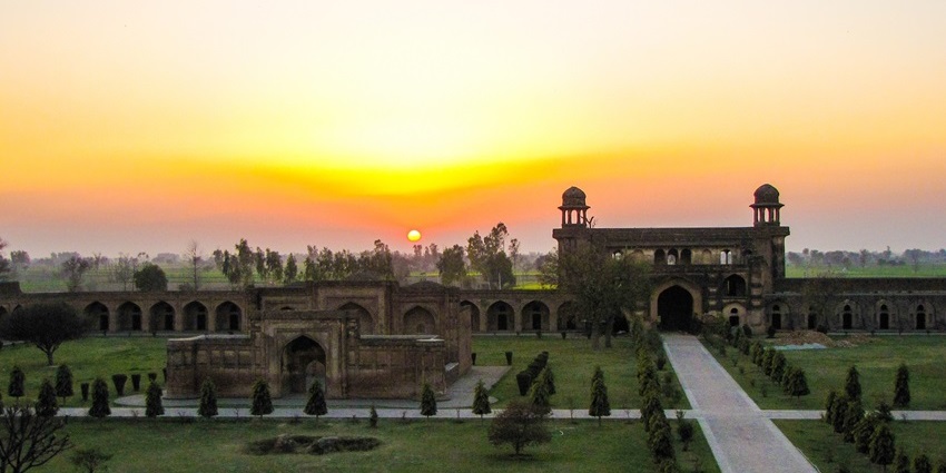 View of historic Caravan Sarai with arched gateways - one of the places to visit in Mandu.