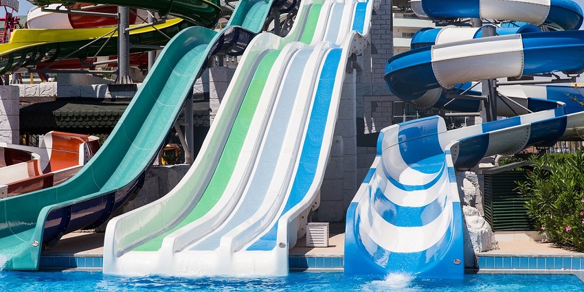 Visitors enjoying the slides and splash pools at Cascade Water Park, highlighting its appeal as one of the water parks in Alwar.