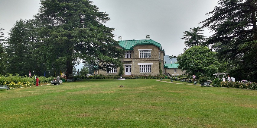 Image of the Palace, having a lawn, bar, dining room and other modern amenities