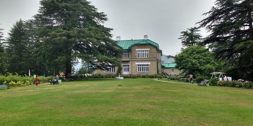 Picturesque view of the Palace, having a lawn, bar, dining room and other modern amenities
