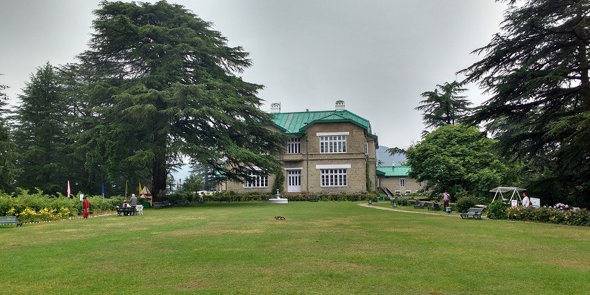 Image of the Palace, having a lawn, bar, dining room and other modern amenities
