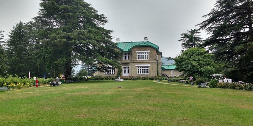 A glimpse of the Chail Palace on the lush green manicured grounds in Chail, Himachal.
