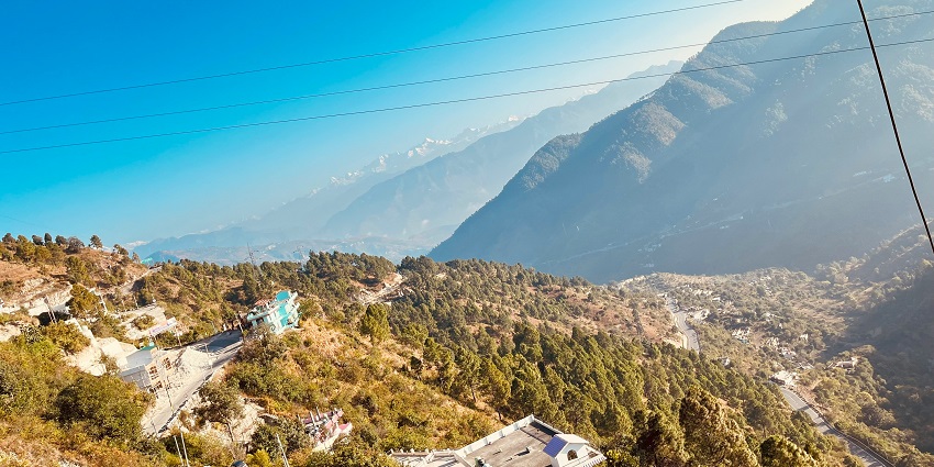 Beautiful view of people enjoying on snow covered mountain during daytime