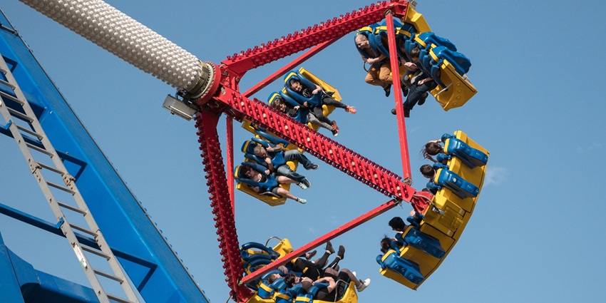 Visitors enjoying carousels at Chambal Gardens park, capturing the fun and excitement.