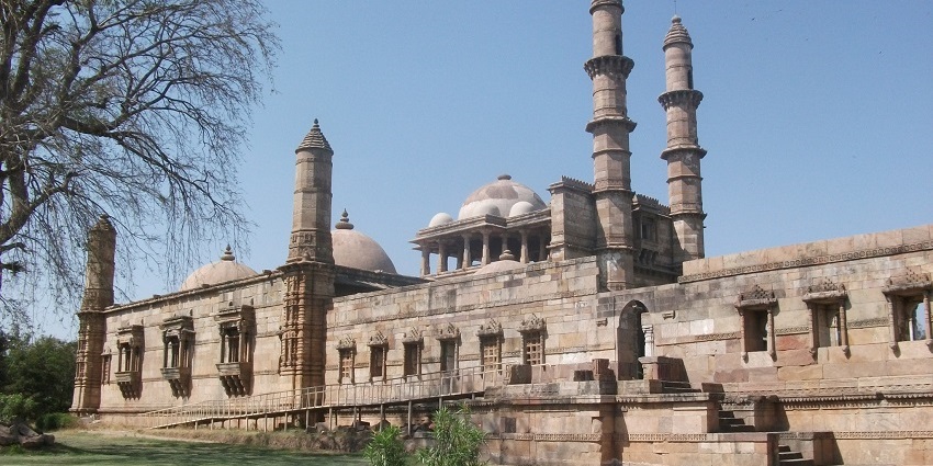 Champaner-Pavagadh Archaeological Park is home to numerous historical monuments including mosques, palaces, and temples.
