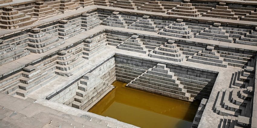 Haveli adjacent to Chand Baori stepwell, showcasing traditional architecture of step wells