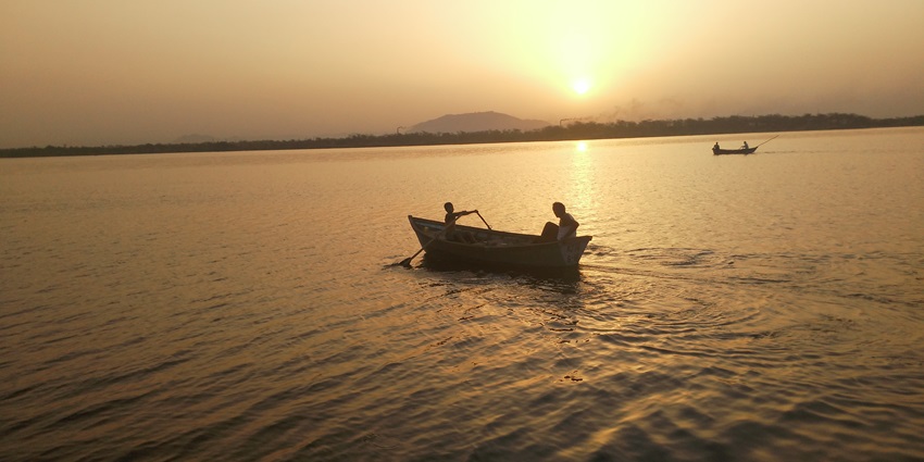 A tranquil lake with flocks of migratory birds, offering a peaceful natural retreat, one of the best places to visit near Jaipur within 100 km.