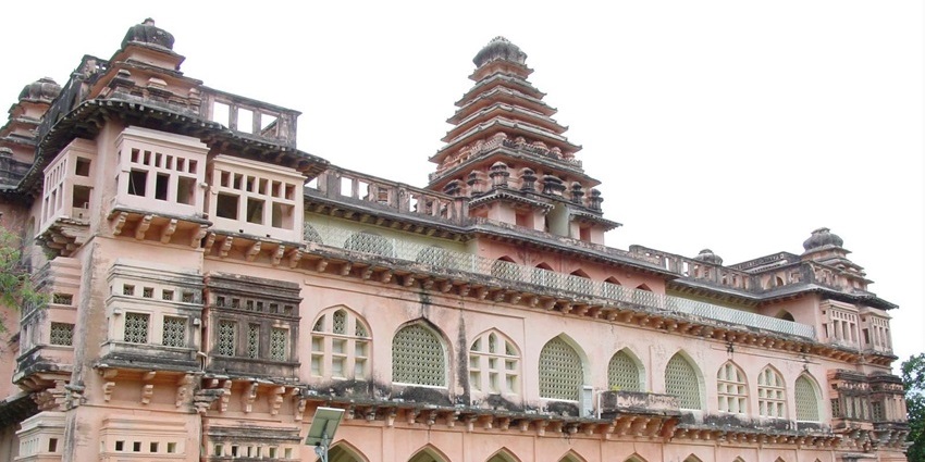 Chandragiri Fort on a hillside with palaces and walls under overcast sky