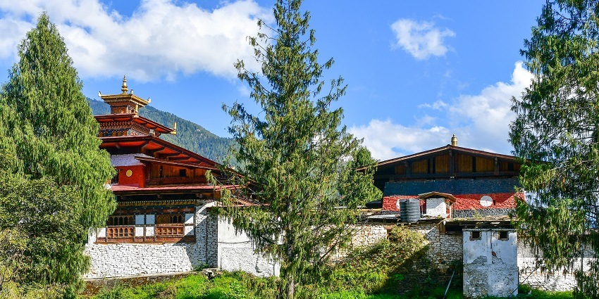 Changangkha Lhakhang, a historic and revered temple in Thimphu, Bhutan, set against lush hills