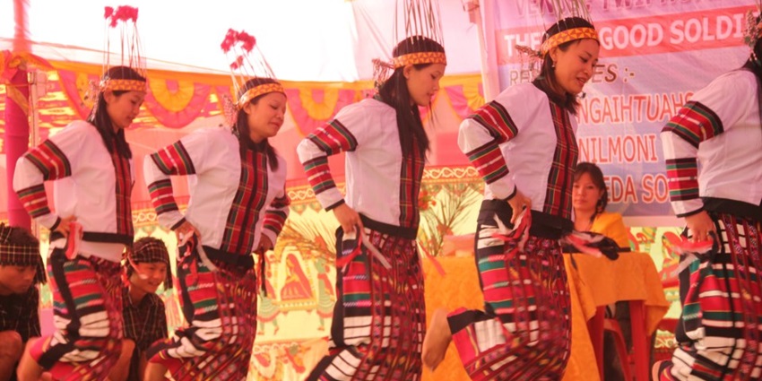 A picture of girls giving a cultural performance on the occasion of Chapchar Kut