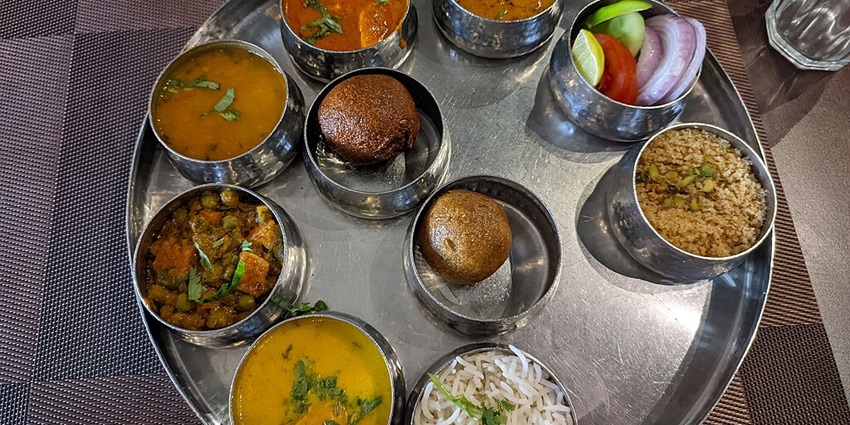 Chappan Bhog in Udaipur serves rich, flavorful traditional snacks and sweets.