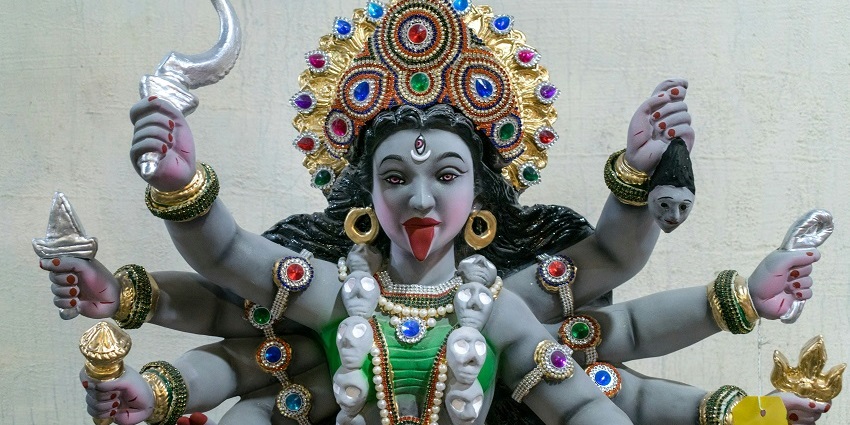 An inside view of the famous Charchika tourist attraction featuring an idol of Chamunda.