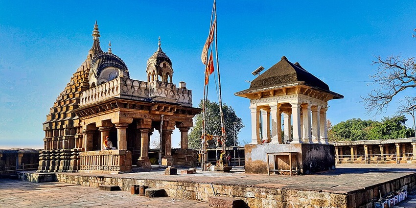 Chausath Yogini Temple, one of the Odisha Temples, showcasing a prominent flagpole.