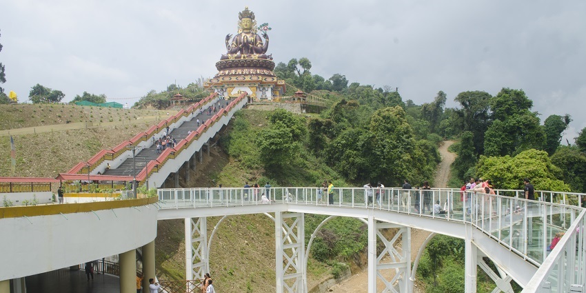 Beautiful snapshot of the pelling skywalk and the iconic statue of Buddha in meditation