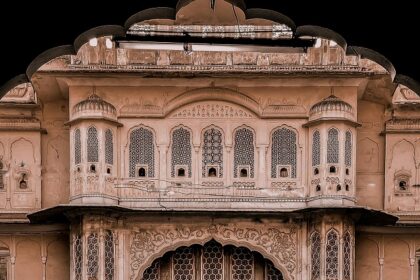 Wide angle view of the Chhachhrauli fort through an archway, showcasing the intricate architecture