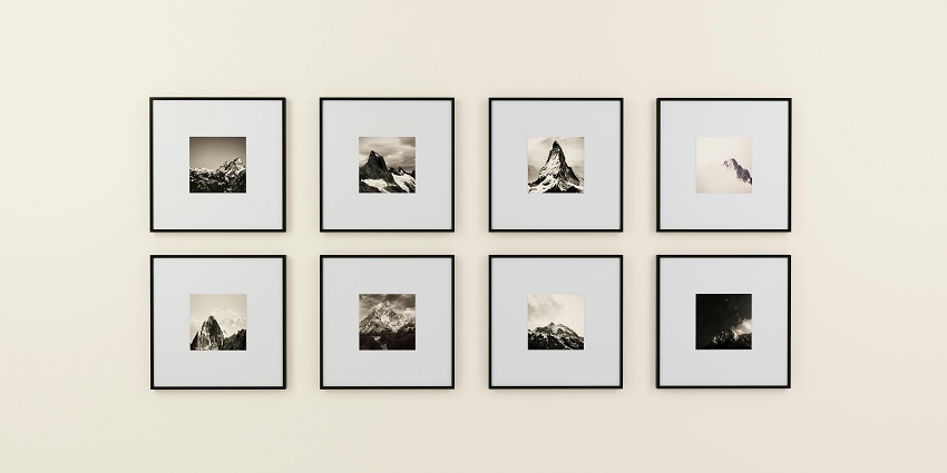 Black and white painting in sqaure shape systematically hanging at the tourist hotpsot.