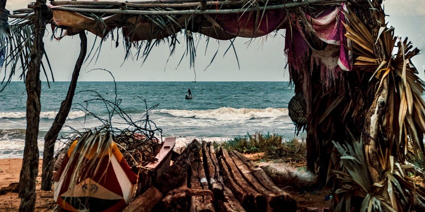 A boat hanger near Chirala beach, Andhra Pradesh, set against the serene backdrop of the coastal landscape.