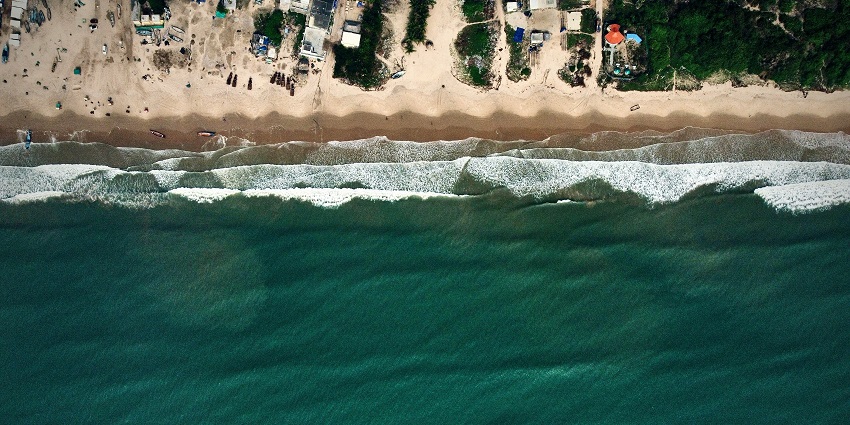A glimpse of the cobalt blue waters meeting the pristine golden sands of Chirala Beach.