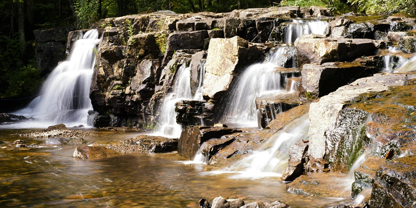 Chitradhara is a gentle cascade among the Chhattisgarh waterfalls flowing over rocky terrain.