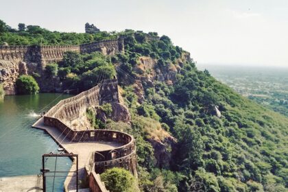 A wide-angle view of the historic city of Chittorgarh, featuring the expansive meadows.