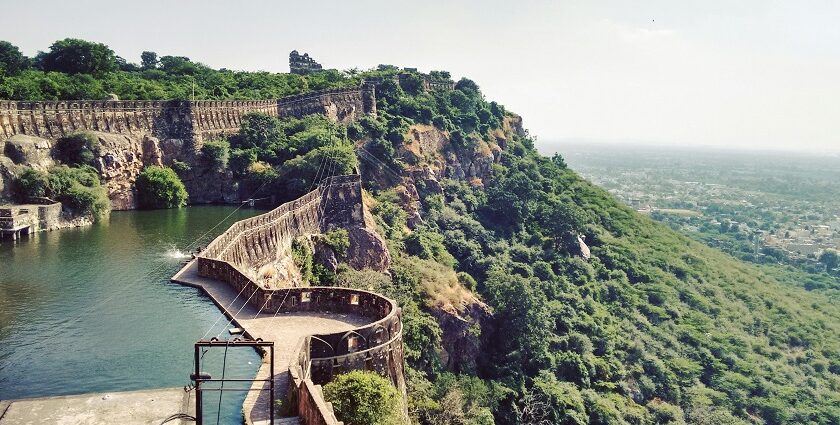 A wide-angle view of the historic city of Chittorgarh, featuring the expansive meadows.