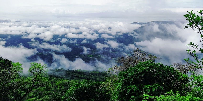 Panraromic image of the Chorla Ghar over the clouds amsit the jungle near the Goa hillstation