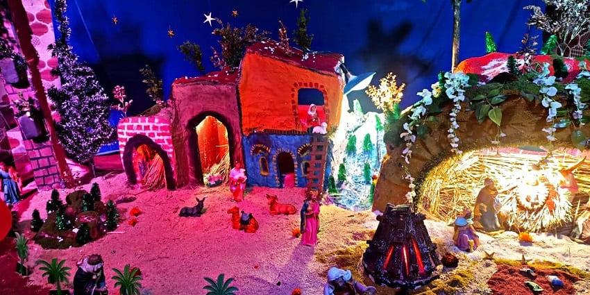 A small model of picture-perfect Christmas made at a church during celebrations