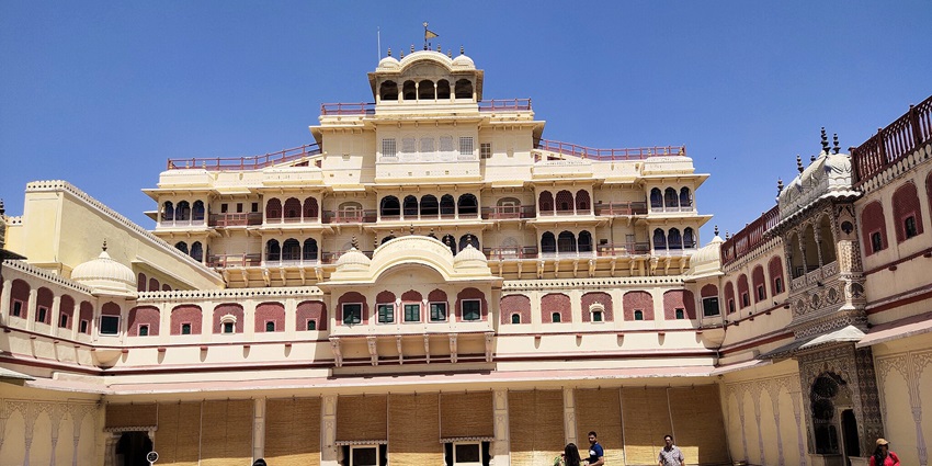 The exterior view of Jaipur City Palace in Rajasthan, a major tourist attraction near Anokhi Museum.