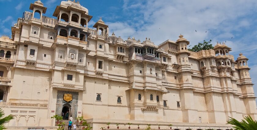 Majestic front view of the City Palace Museum, Udaipur showcasing grand architecture.