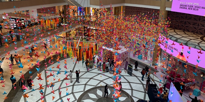 Aerial view of the building's interiors from the top floor, looking down at the stalls.