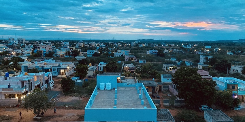 Aerial view of Nellore city in Andhra Pradesh, showcasing its urban landscape and surrounding greenery.