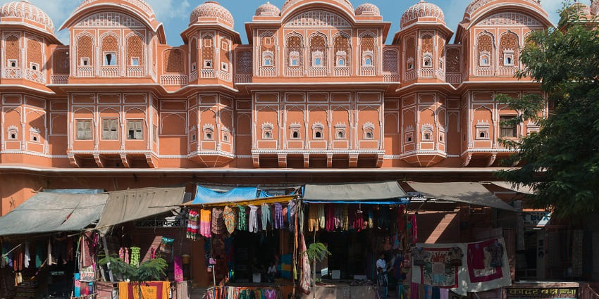 Lively market near Jodhpur’s Clock Tower offers spices, antiques, textiles, snacks.