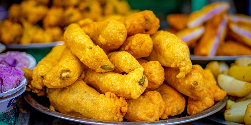 Lively market near Jodhpur’s Clock Tower offers spices, antiques, textiles, snacks.