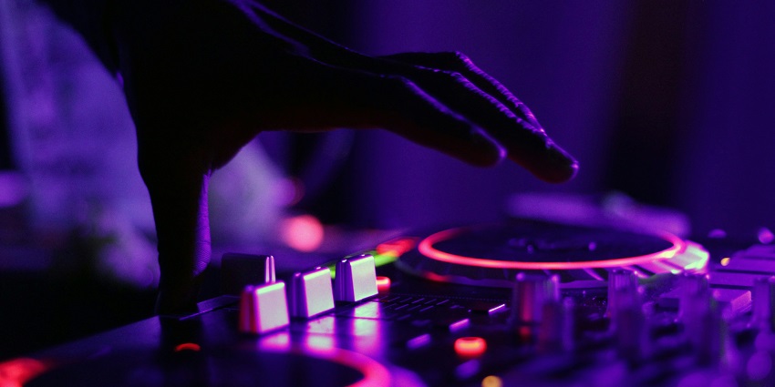 A view of a DJ playing rhythmic music at the Club Cubana, a famous club in the area.