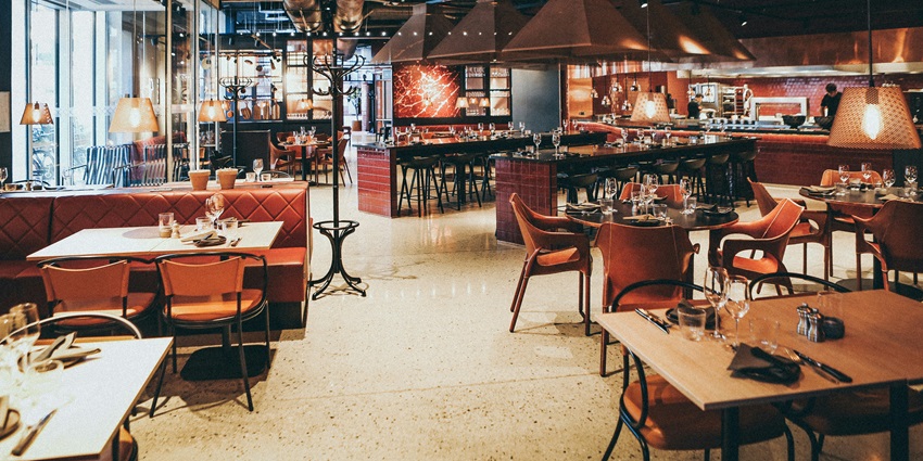 A high-end restaurant at Club Street offering aesthetically pleasing setting and warmth.