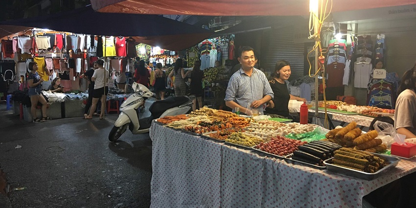 Hanoi Weekend Night market, a great place for shopping in Hanoi , looks beautiful with lights and decorations.